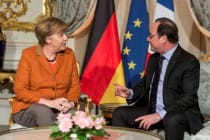 Hollande, Merkel stressed migrant crisis needs EU solution