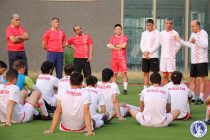 Football Team Conducts Recovery Training After Match Against Japan