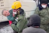 Tajik Rescuers Remove from the Rubble a Three-Year-Old Boy Named Yavuz